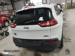 2015 Jeep Cherokee Latitude z VIN 1C4PJMCB4FW635406, wystawiony jako IAAI lot #41168412 z przebiegiem 131 089 mil mil oraz . Historia ofert i sprzedaży dostępna na DreamBid. Obrazek 16.