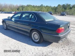 1998 BMW 7 Series 740il with VIN WBAGJ8323WDM13455, listed as a IAAI auction lot 41888636 with 1 mi miles. Bid and sale history available at carsss.com. Image 3.