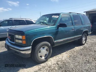 1996 GMC Yukon with VIN 1GKEK13R3TJ750284, listed as a Copart auction lot 69022244 with 266,366 mi miles and Salvage Title. Bid and sale history available at carsss.com. Image 1.