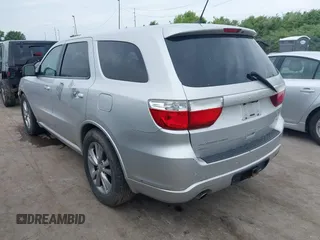 2011 Dodge Durango R/T with VIN 1D4SE6GT9BC682703, listed as a IAAI auction lot 42523174 with 177,043 mi miles and . Bid and sale history available at DreamBid. Image 3.