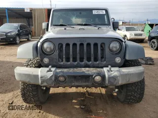 2015 Jeep Wrangler Unlimited Willys Wheeler with VIN 1C4BJWDG7FL690952, listed as a Copart auction lot 51493715 with 45,497 mi miles and Salvage Title. Bid and sale history available at DreamBid. Image 5.
