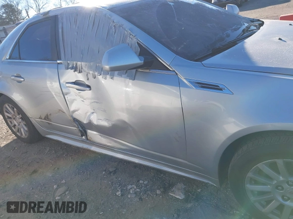 2010 Cadillac CTS Luxury with VIN 1G6DE5EG6A0111713, listed as a IAAI auction lot 41151719 with 138,277 mi miles and . Bid and sale history available at DreamBid. Image 6.