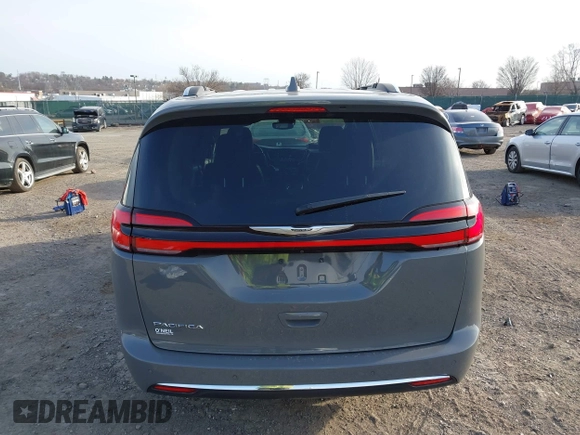 2021 Chrysler Pacifica Touring L with VIN 2C4RC1BG4MR598328, listed as a IAAI auction lot 41749306 with 78,035 mi miles and . Bid and sale history available at DreamBid. Image 16.