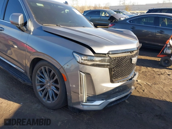 2021 Cadillac Escalade Premium Luxury z VIN 1GYS4CKL2MR231788, wystawiony jako IAAI lot #41630686 z przebiegiem 56 672 mil mil oraz . Historia ofert i sprzedaży dostępna na DreamBid. Obrazek 18.