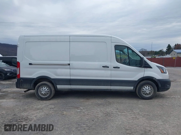 2020 Ford Transit Cargo z VIN 1FTBR2C86LKB45614, wystawiony jako IAAI lot #41665561 z przebiegiem 50 727 mil mil oraz . Historia ofert i sprzedaży dostępna na DreamBid. Obrazek 13.
