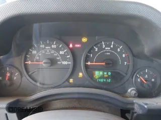 2007 Jeep Wrangler X with VIN 1J4FA24137L128418, listed as a IAAI auction lot 42317921 with 148,412 mi miles and . Bid and sale history available at DreamBid. Image 7.