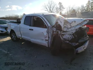 2018 Toyota Tundra SR with VIN 5TFUM5F1XJX075879, listed as a Copart auction lot 83666824 with 130,059 mi miles and Salvage title. Bid and sale history available at DreamBid. Image 4.