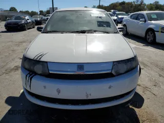 2003 Saturn ION ION 1 z VIN 1G8AF52F83Z151812, wystawiony jako Copart lot #77000594 z przebiegiem 313 620 mil mil oraz Szkoda całkowita • Salvage title. Historia ofert i sprzedaży dostępna na DreamBid. Obrazek 5.