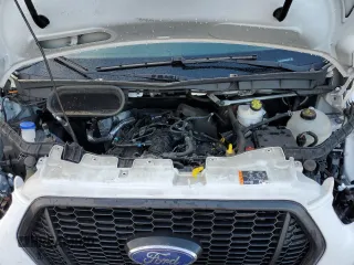 2021 Ford Transit Cargo with VIN 1FTBR1CG7MKA88875, listed as a Copart auction lot 84705324 with 23,654 mi miles and Salvage Title. Bid and sale history available at DreamBid. Image 12.