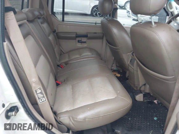 2004 Ford Explorer Sport Trac XLS z VIN 1FMZU67K64UB35063, wystawiony jako IAAI lot #42092229 z przebiegiem 344 554 mil mil oraz . Historia ofert i sprzedaży dostępna na DreamBid. Obrazek 8.