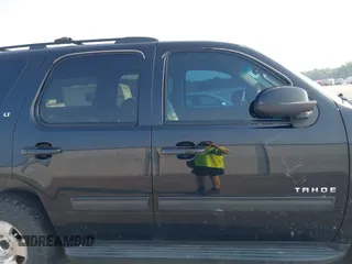 2014 Chevrolet Tahoe LT with VIN 1GNSCBE01ER235571, listed as a IAAI auction lot 42403118 with 238,069 mi miles and . Bid and sale history available at DreamBid. Image 13.