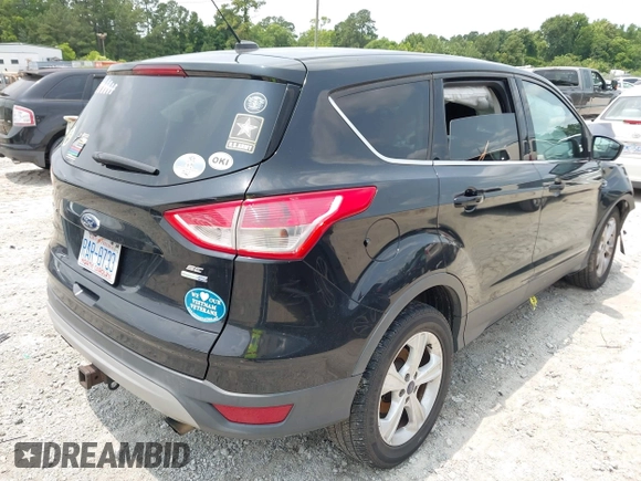 2014 Ford Escape SE with VIN 1FMCU9G93EUD42449, listed as a IAAI auction lot 42399275 with 166,868 mi miles and . Bid and sale history available at DreamBid. Image 4.