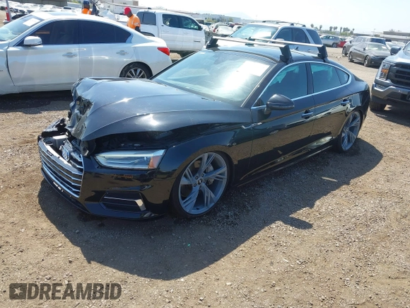 2018 Audi A5 Sportback Premium z VIN WAUANCF53JA003557, wystawiony jako IAAI lot #42079150 z przebiegiem 78 259 mil mil oraz . Historia ofert i sprzedaży dostępna na DreamBid. Obrazek 17.