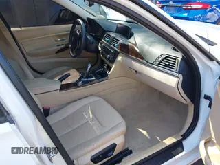 2014 BMW 3 Series 328i xDrive with VIN WBA3B3C55EJ979836, listed as a IAAI auction lot 41886624 with 140,684 mi miles. Bid and sale history available at carsss.com. Image 5.