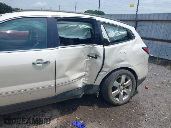 2014 Chevrolet Traverse LTZ with VIN 1GNKRJKD2EJ287211, listed as a IAAI auction lot 39873394 with 128,355 mi miles and . Bid and sale history available at DreamBid. Image 6.