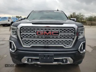 2020 GMC Sierra 1500 Denali z VIN 3GTU9FET7LG441170, wystawiony jako Copart lot #77635974 z przebiegiem 65 028 mil mil oraz Czysty tytuł • Clean title. Historia ofert i sprzedaży dostępna na DreamBid. Obrazek 5.