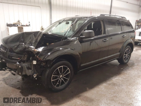 2017 Dodge Journey SE z VIN 3C4PDCAB4HT695490, wystawiony jako IAAI lot #41301719 z przebiegiem 103 642 mil mil oraz . Historia ofert i sprzedaży dostępna na DreamBid. Obrazek 2.