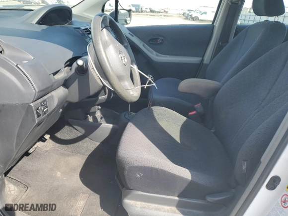 2009 Toyota Yaris with VIN JTDKT903495224256, listed as a Copart auction lot 50065565 with 164,473 mi miles and Salvage Title. Bid and sale history available at carsss.com. Image 7.