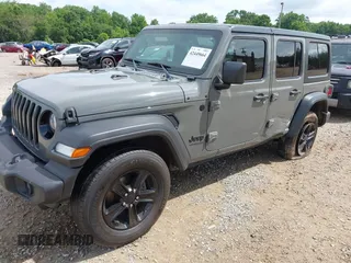 2020 Jeep Wrangler Unlimited Freedom with VIN 1C4HJXDG2LW186027, listed as a IAAI auction lot 42449664 with 87,869 mi miles and . Bid and sale history available at DreamBid. Image 2.