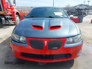 2005 Pontiac GTO with VIN 6G2VX12UX5L407635, listed as a IAAI auction lot 41768211 with 82,365 mi miles. Bid and sale history available at carsss.com. Image 12.