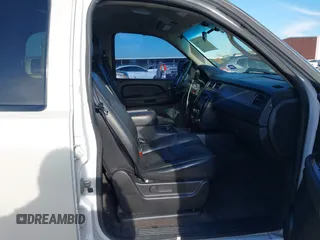 2012 Chevrolet Tahoe Commercial with VIN 1GNLC2E0XCR185593, listed as a IAAI auction lot 41217784 with 150,419 mi miles and . Bid and sale history available at DreamBid. Image 5.
