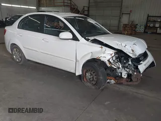 2010 Kia Rio LX with VIN KNADH4A34A6643439, listed as a IAAI auction lot 41808558 with 63,033 mi miles. Bid and sale history available at carsss.com. Image 1.