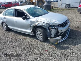 2015 Volkswagen Jetta Sedan 1.8T SE with VIN 3VWD17AJ3FM297573, listed as a IAAI auction lot 41884541 with 98,225 mi miles. Bid and sale history available at carsss.com. Image 1.