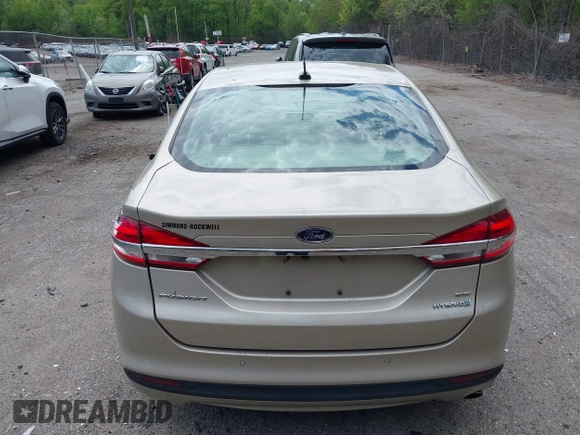 2017 Ford Fusion Hybrid SE с VIN 3FA6P0LU4HR301943, выставлен на аукционе IAAI как лот 42217709 с пробегом 102 791 миль миль и . История ставок и продаж доступна на DreamBid. Изображение 16.