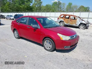 2009 Ford Focus S with VIN 1FAHP34N69W102568, listed as a IAAI auction lot 42137185 with 113,099 mi miles. Bid and sale history available at carsss.com. Image 1.