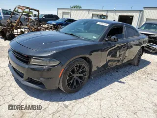 2015 Dodge Charger SXT with VIN 2C3CDXHG1FH832399, listed as a Copart auction lot 57242115 with 172,550 mi miles and Salvage title. Bid and sale history available at DreamBid. Image 1.