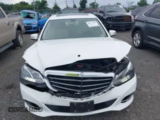 2014 Mercedes-Benz E 350 Luxury with VIN WDDHF8JB5EB040219, listed as a IAAI auction lot 42771799 with 65,454 mi miles and . Bid and sale history available at DreamBid. Image 12.