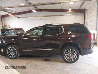 2021 GMC Acadia Denali with VIN 1GKKNXLS2MZ140119, listed as a IAAI auction lot 42553557 with 50,197 mi miles and . Bid and sale history available at DreamBid. Image 14.