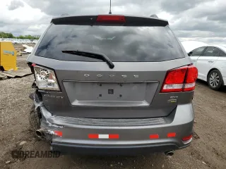 2012 Dodge Journey SXT z VIN 3C4PDCBG3CT213515, wystawiony jako Copart lot #58128845 z przebiegiem 208 152 mil mil oraz Szkoda całkowita • Salvage title. Historia ofert i sprzedaży dostępna na DreamBid. Obrazek 6.