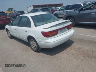 2002 Saturn SL с VIN 1G8ZK52732Z222128, выставлен на аукционе IAAI как лот 42476981 с пробегом 165 454 миль миль и . История ставок и продаж доступна на DreamBid. Изображение 3.