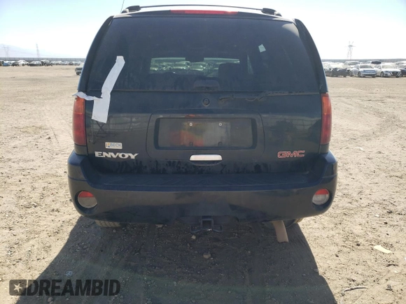 2002 GMC Envoy SLT with VIN 1GKDT13S022107749, listed as a Copart auction lot 59548544 with 221,224 mi miles and Clean Title. Bid and sale history available at DreamBid. Image 6.