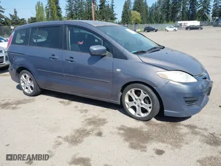 2009 Mazda Mazda5 Sport with VIN JM1CR293890352218, listed as a IAAI auction lot 42121590 with 168,302 mi miles. Bid and sale history available at carsss.com. Image 1.
