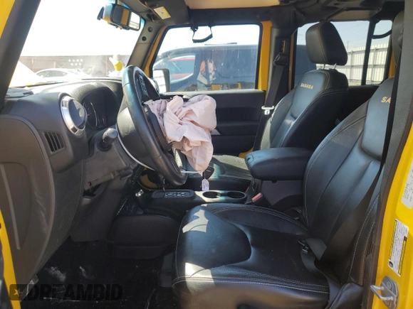 2015 Jeep Wrangler Unlimited Sahara with VIN 1C4HJWEG7FL593355, listed as a Copart auction lot 56784425 with 74,498 mi miles and Salvage title. Bid and sale history available at DreamBid. Image 7.
