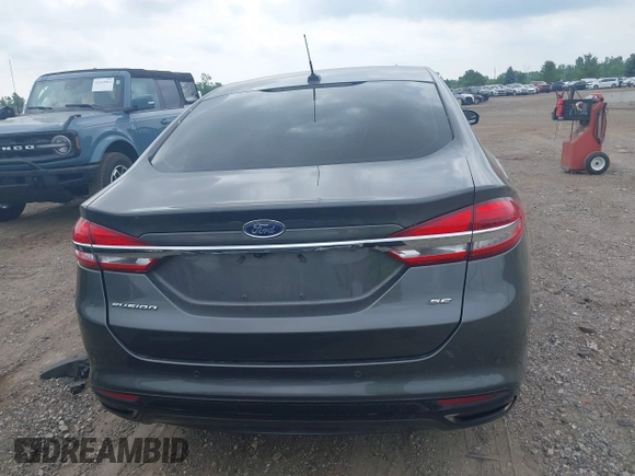 2017 Ford Fusion SE with VIN 3FA6P0T9XHR186017, listed as a IAAI auction lot 42535725 with 166,794 mi miles and . Bid and sale history available at DreamBid. Image 16.