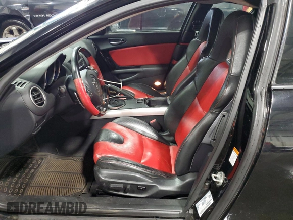 2004 Mazda RX-8 with VIN JM1FE17N240135103, listed as a Copart auction lot 77572594 with 85,089 mi miles and Salvage Title. Bid and sale history available at DreamBid. Image 7.