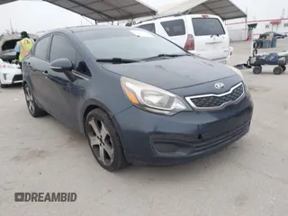2013 Kia Rio SX with VIN KNADN4A30D6284121, listed as a IAAI auction lot 42109956 with 79,883 mi miles. Bid and sale history available at carsss.com. Image 1.
