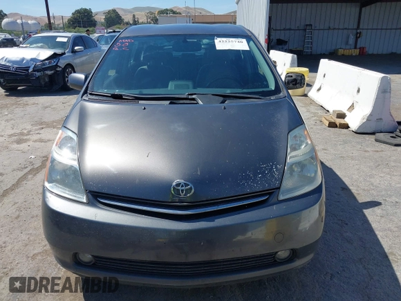 2007 Toyota Prius z VIN JTDKB20UX73217307, wystawiony jako IAAI lot #42225740 z przebiegiem 196 251 mil mil oraz . Historia ofert i sprzedaży dostępna na DreamBid. Obrazek 12.