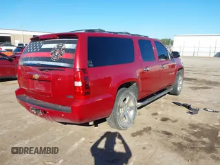 2012 Chevrolet Suburban LS with VIN 1GNSCHE08CR327180, listed as a IAAI auction lot 40229963 with 235,469 mi miles. Bid and sale history available at carsss.com. Image 4.
