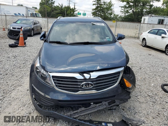 2012 Kia Sportage LX z VIN KNDPBCA27C7234285, wystawiony jako Copart lot #65807995 z przebiegiem 178 515 mil mil oraz Czysty tytuł • Clean title. Historia ofert i sprzedaży dostępna na DreamBid. Obrazek 5.