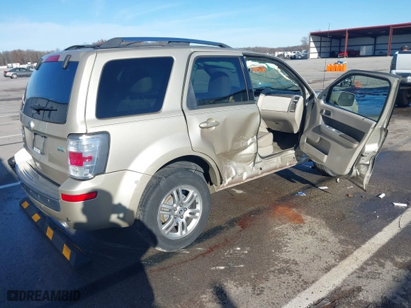 2011 Mercury Mariner Premier with VIN 4M2CN9HG4BKJ05985, listed as a IAAI auction lot 41132168 with 84,031 mi miles. Bid and sale history available at carsss.com. Image 4.
