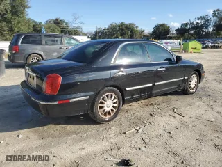 2004 Hyundai XG350 with VIN KMHFU45E84A357206, listed as a Copart auction lot 87128594 with 115,069 mi miles and Salvage Title. Bid and sale history available at carsss.com. Image 3.