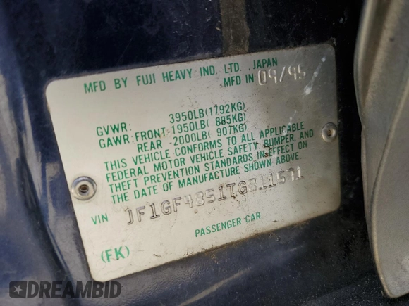 1996 Subaru Impreza Outback with VIN JF1GF4851TG811571, listed as a Copart auction lot 65650514 with 248,315 mi miles and Salvage title. Bid and sale history available at DreamBid. Image 12.