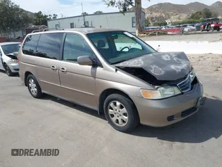 2004 Honda Odyssey EX-L with VIN 5FNRL18964B023460, listed as a IAAI auction lot 42249785 with 199,425 mi miles and . Bid and sale history available at DreamBid. Image 1.