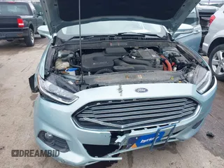 2013 Ford Fusion SE Hybrid with VIN 3FA6P0LUXDR339767, listed as a IAAI auction lot 41920621 with 135,274 mi miles. Bid and sale history available at carsss.com. Image 6.