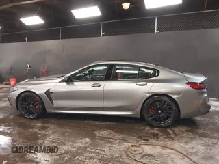 2022 BMW M8 Competition z VIN WBSGV0C04NCH71560, wystawiony jako IAAI lot #41542278 z przebiegiem 28 117 mil mil oraz . Historia ofert i sprzedaży dostępna na DreamBid. Obrazek 14.