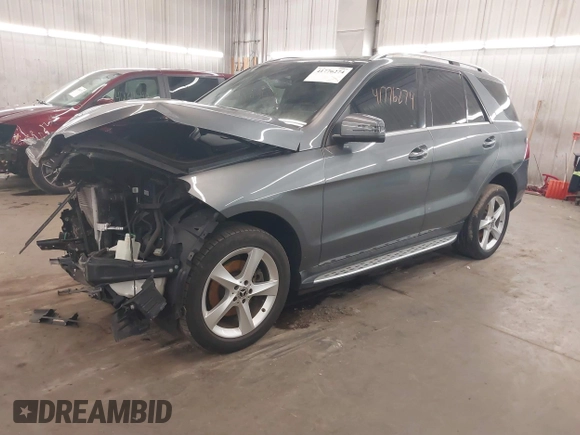 2018 Mercedes-Benz GLE 350 with VIN 4JGDA5JB3JA997403, listed as a IAAI auction lot 41776274 with 104,359 mi miles and . Bid and sale history available at DreamBid. Image 18.
